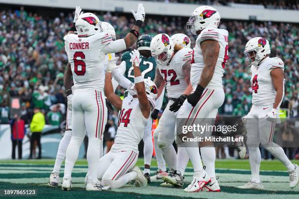 Michael Wilson of the Arizona Cardinals celebrates with teammates after a touchdown catch during the fourth quarter against the Philadelphia Eagles...