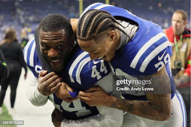 Zaire Franklin and JuJu Brents of the Indianapolis Colts react after the game against the Las Vegas Raiders at Lucas Oil Stadium on December 31, 2023...