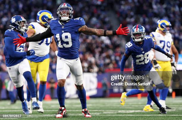 Isaiah Simmons of the New York Giants celebrates with teammates after a sack during the second half against the Los Angeles Rams at MetLife Stadium...