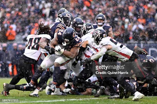 Khalil Herbert of the Chicago Bears rushes for a touchdown during the fourth quarter against the Atlanta Falcons at Soldier Field on December 31,...