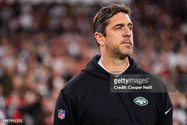 Aaron Rodgers of the New York Jets looks on on from the sideline prior to an NFL football game against the Cleveland Browns at Cleveland Browns...