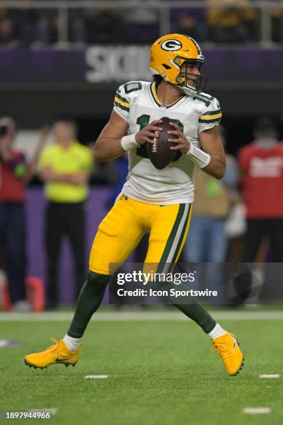 Green Bay Packers quarterback Jordan Love drops back to pass during an NFL game between the Minnesota Vikings and Green Bay Packers on December 31 at...
