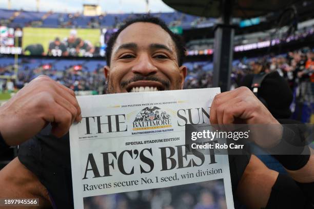 Andrew Adams of the Baltimore Ravens celebrates after defeating the Miami Dolphins at M&T Bank Stadium on December 31, 2023 in Baltimore, Maryland.