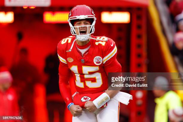 Patrick Mahomes of the Kansas City Chiefs runs onto the field before the game against the Cincinnati Bengals at GEHA Field at Arrowhead Stadium on...