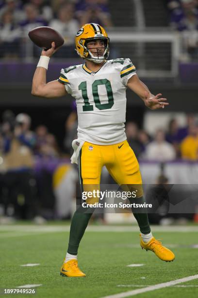 Green Bay Packers quarterback Jordan Love throws on the run during an NFL game between the Minnesota Vikings and Green Bay Packers on December 31 at...