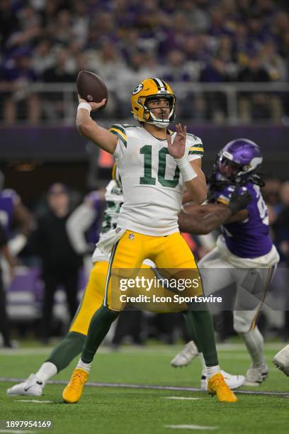 Green Bay Packers quarterback Jordan Love makes a pass during an NFL game between the Minnesota Vikings and Green Bay Packers on December 31 at U.S....