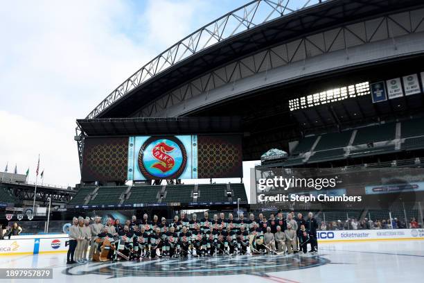 The Seattle Kraken pose for a team picture during practice before the Discover NHL Winter Classic at T-Mobile Park on December 31, 2023 in Seattle,...