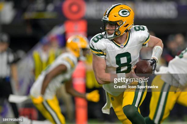 Green Bay Packers wide receiver Bo Melton goes to hand the ball off during an NFL game between the Minnesota Vikings and Green Bay Packers on...