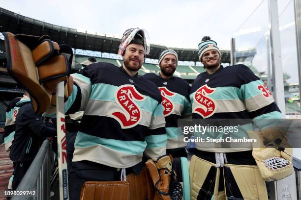 Philipp Grubauer, Chris Driedger and Joey Daccord of the Seattle Kraken pose for a photo during practice before the Discover NHL Winter Classic at...