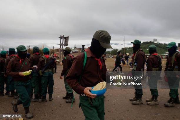 Members of the Zapatista National Liberation Army are preparing to have breakfast at El Caracol Rebeldia y Resistencia in the mountains of southeast...