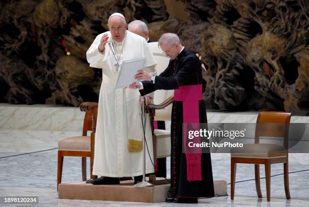 Pope Francis is arriving for his weekly general audience in the Pope Paul VI hall at the Vatican, on January 3, 2024.