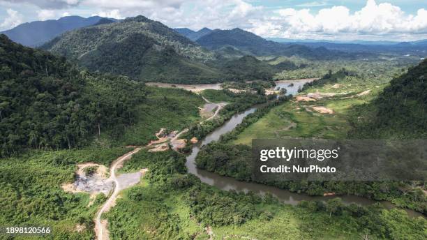 Construction workers are building the biggest hydropower plant in Southeast Asia along the Kayan River at Long Peso, Bulungan, in North Kalimantan,...
