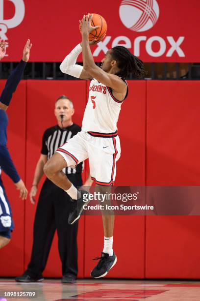 St John's Red Storm guard Daniss Jenkins shoots from the baseline during the men's college basketball game between the Butler Bulldogs and St. John's...