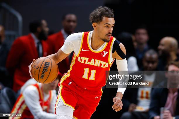 Trae Young of the Atlanta Hawks drives to the basket during the first quarter against the Oklahoma City Thunder at State Farm Arena on January 3,...