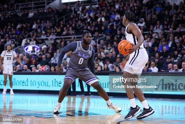 Seton Hall Pirates guard Dylan Addae-Wusu defends Providence Friars guard Jayden Pierre during the college basketball game between Seton Hall Pirates...