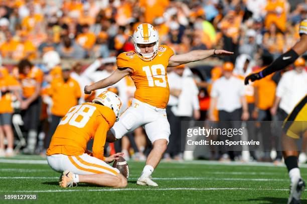 Tennessee Volunteers place kicker Charles Campbell kicks an extra point during the Cheez-It Citrus Bowl game between the Tennessee Volunteers and the...