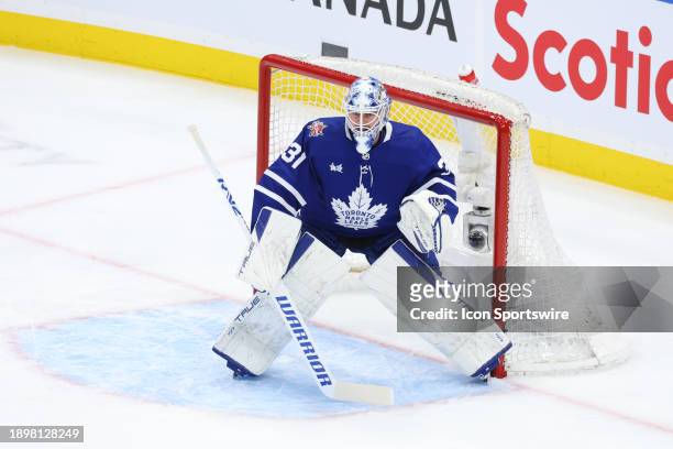 Toronto Maple Leafs goaltender Martin Jones tracks the puck in goal in the first period during the NHL regular season game between the New York...