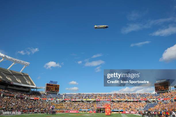 The Goodyear Blimp flies over Camping World Stadium during the Cheez-It Citrus Bowl game between the Tennessee Volunteers and the Iowa Hawkeyes on...