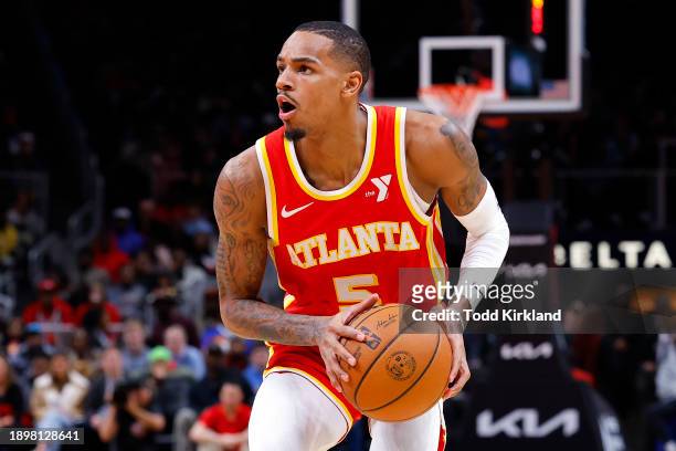 Dejounte Murray of the Atlanta Hawks looks to shoot during the third quarter against the Oklahoma City Thunder at State Farm Arena on January 3, 2024...