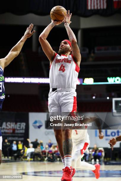 Timmy Allen of the Memphis Hustle shoots the ball during the game against the Iowa Wolves during an NBA G-League game on January 3, 2024 at the Wells...