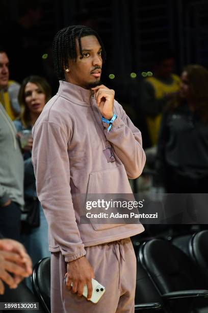 Heisman recipient Jayden Daniels of LSU attends the game between the Miami Heat and Los Angeles Lakers on January 3, 2024 at Crypto.Com Arena in Los...