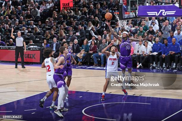 Jordan Clarkson of the Utah Jazz rebounds the ball during the game against the Detroit Pistons on January 1, 2024 at vivint.SmartHome Arena in Salt...