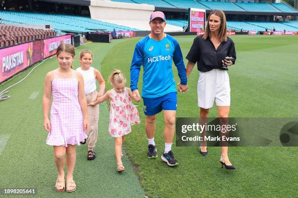 Australia's David Warner, wife Candice Warner and children leave after a press conference ahead of the Third Test Match between Australia and...