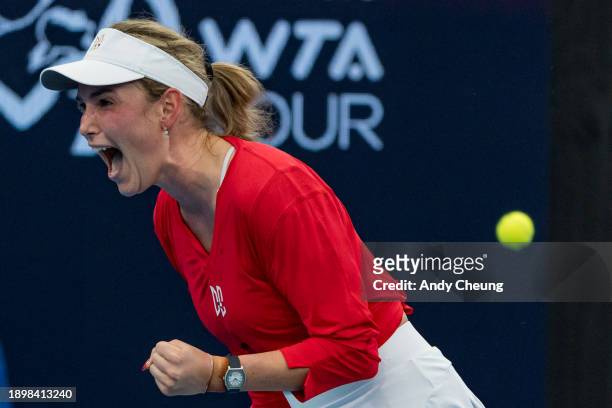 Donna Vekic of Team Croatia celebrates winning set point in the Group B match against Malene Helgo of Team Norway during day three of the 2024 United...
