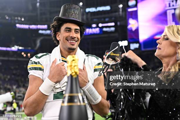 Jordan Love of the Green Bay Packers reacts after a 33-10 victory against the Minnesota Vikings at U.S. Bank Stadium on December 31, 2023 in...