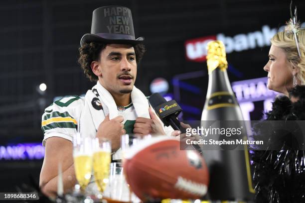 Kathryn Tappen interviews Jordan Love of the Green Bay Packers after a 33-10 victory against the Minnesota Vikings at U.S. Bank Stadium on December...