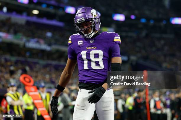 Justin Jefferson of the Minnesota Vikings reacts during the fourth quarter against the Green Bay Packers at U.S. Bank Stadium on December 31, 2023 in...