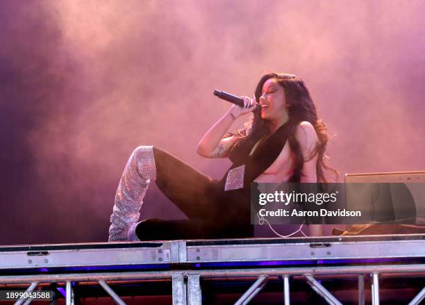 Cardi B performs onstage at The Fontainebleau Miami Beach NYE 2024 Celebration with Cardi B And DJ Gryffin at Fontainebleau Miami Beach on December...