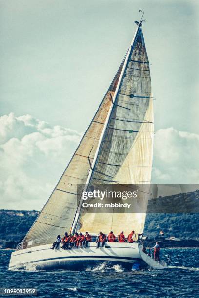 sailing crew on sailboat on regatta - regatta stock pictures, royalty-free photos & images