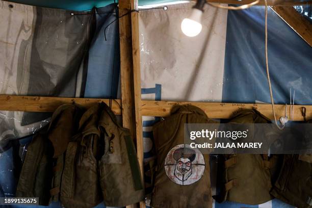 Flack jacket bearing a patch on it's back showing Lebanon's Hezbollah leader Hassan Nasrallah as a target, hangs at an Israeli military position in...