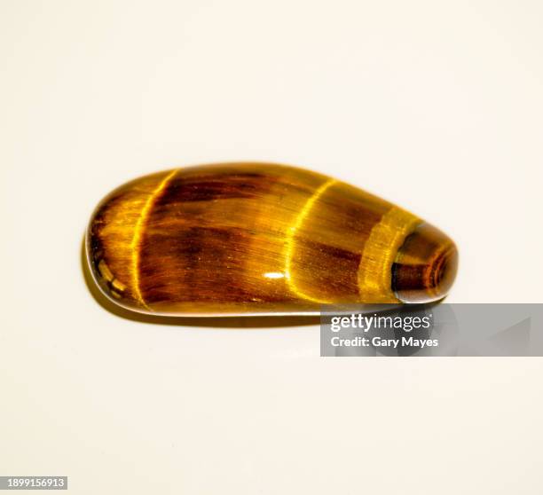 tigers eye semiprecious gem stone - tiger eye stock pictures, royalty-free photos & images