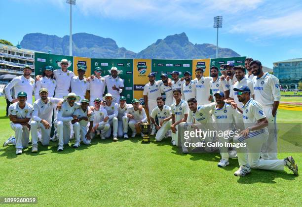 South Africa and India squad pose as the series ends in a draw during day 2 of the 2nd Test match between South Africa and India at Newlands Cricket...