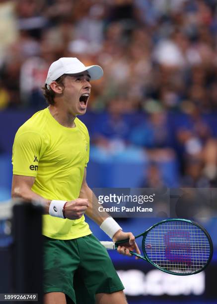 Alex de Minaur of Team Australia celebrates winning his singles match against Taylor Fritz of Team USA during day four of the 2024 United Cup at RAC...