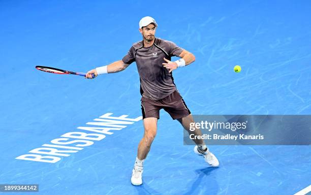 Andy Murray of Great Britain plays a forehand in his match against Grigor Dimitrov of Bulgaria during day two of the 2024 Brisbane International at...