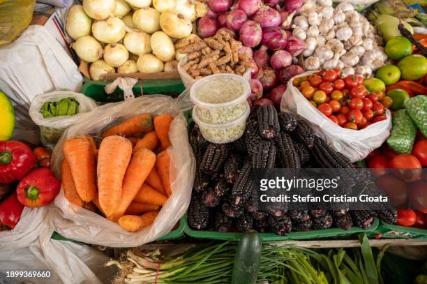 corn and vegetables for sale in the market of cuzco, peru - bell pepper field stock pictures, royalty-free photos & images