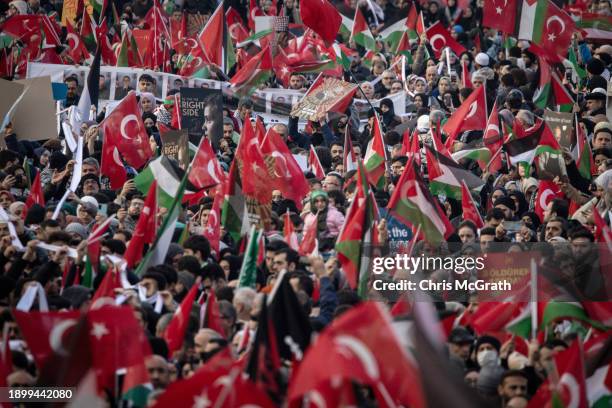 People take part in a solidarity protest over events happening in Gaza and the West Bank on January 01, 2024 in Istanbul, Turkey. As the world...