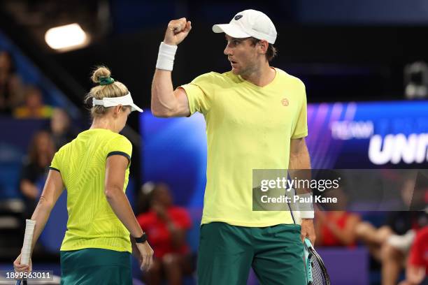 Matt Ebden of Team Australia celebrates a point in the mixed doubles partnered with Storm Hunter against Jessica Pegula and Rajeev Ram of Team USA...