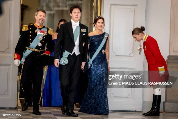 Picture taken on October 15, 2023 shows Prince Christian of Denmark arriving at Christiansborg Castle on his 18th birthday flanked by Crown Princess...