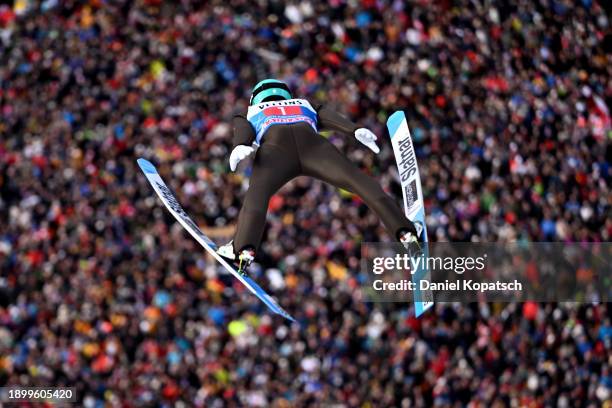 Anze Lanisek of Slovenia competes during the FIS World Cup Ski Jumping Four Hills Tournament Men Individual HS142 on January 01, 2024 in...