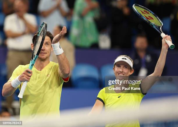 Matt Ebden and Storm Hunter of Team Australia celebrate winning the mixed doubles match against Jessica Pegula and Rajeev Ram of Team USA during day...