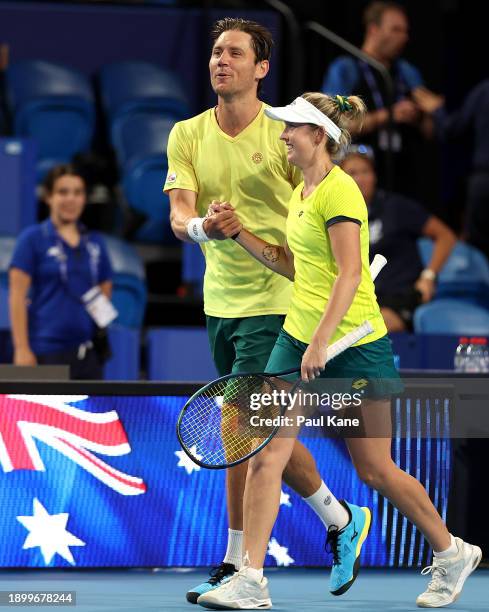 Matt Ebden and Storm Hunter of Team Australia celebrate winning the mixed doubles match against Jessica Pegula and Rajeev Ram of Team USA during day...