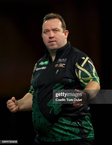 Brendan Dolan of Ireland reacts during his quarter final match against Luke Littler of England on day 14 of the 2023/24 Paddy Power World Darts...