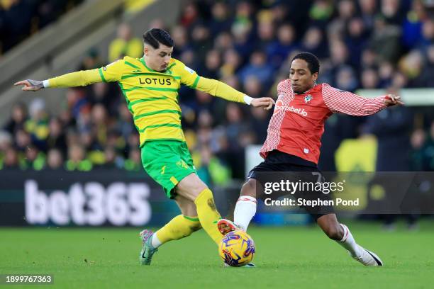 Borja Sainz of Norwich City battles for possession with Kyle Walker-Peters of Southampton during the Sky Bet Championship match between Norwich City...