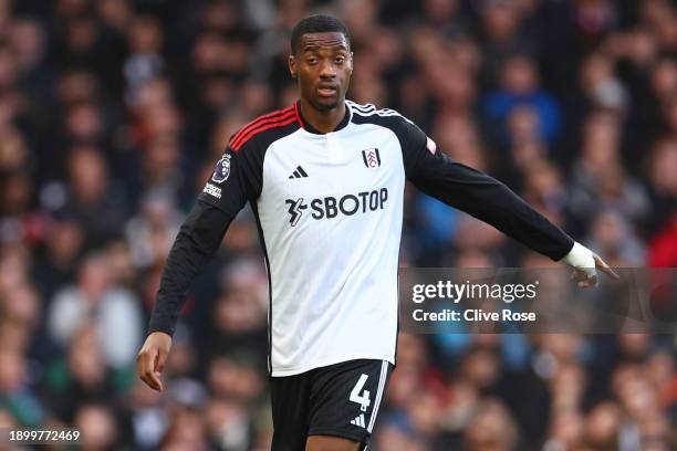 Tosin Adarabioyo of Fulham during the Premier League match between Fulham FC and Arsenal FC at Craven Cottage on December 31, 2023 in London, England.