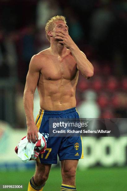 June 15: Johan Mjallby looks dejected after the UEFA Euro 2000 Group B match between Sweden and Turkey at Philips Stadion on June 15, 2000 in...