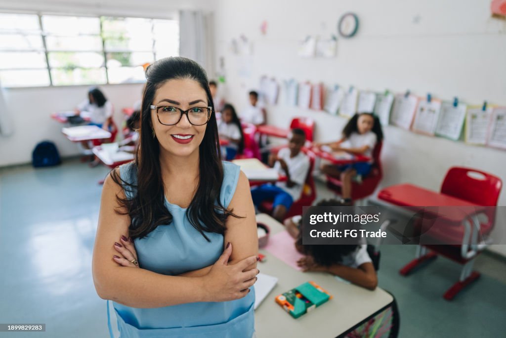Portrait of a teacher on classroom at school